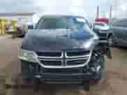 2012 Dodge Journey SE z VIN 3C4PDCAB9CT290198, wystawiony jako IAAI lot #42254160 z przebiegiem 91 000 mil mil oraz . Historia ofert i sprzedaży dostępna na DreamBid. Obrazek 13.