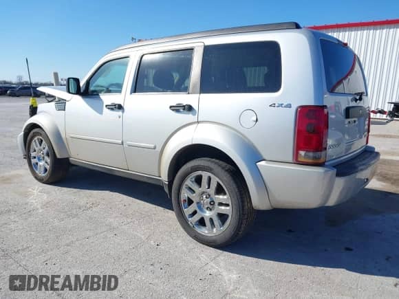 2010 Dodge Nitro Heat with VIN 1D4PU4GK4AW157565, listed as a IAAI auction lot 41851400 with 209,535 mi miles and . Bid and sale history available at DreamBid. Image 3.