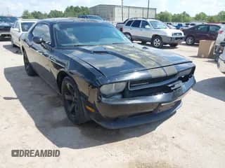 2014 Dodge Challenger SXT с VIN 2C3CDYAGXEH153262, выставлен на аукционе IAAI как лот 43264710 с пробегом 183 611 миль миль и . История ставок и продаж доступна на DreamBid. Изображение 1.