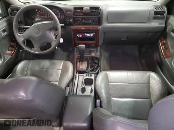 2001 Honda Passport LX with VIN 4S6DM58W814406889, listed as a Copart auction lot 84244735 with 158,711 mi miles and Clean title. Bid and sale history available at DreamBid. Image 8.