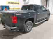 2014 Chevrolet Silverado 1500 LTZ with VIN 3GCUKSEC7EG359343, listed as a IAAI auction lot 42547326 with 164,151 mi miles and . Bid and sale history available at DreamBid. Image 4.