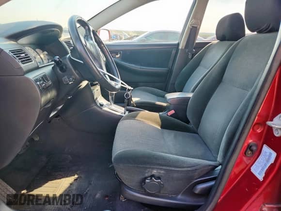 2004 Toyota Corolla S with VIN 1NXBR32E34Z228044, listed as a Copart auction lot 81881455 with 222,315 mi miles and Salvage title. Bid and sale history available at DreamBid. Image 7.