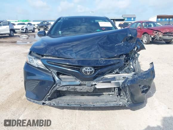 2019 Toyota Camry SE z VIN 4T1B11HK7KU276104, wystawiony jako IAAI lot #42741592 z przebiegiem 101 390 mil mil oraz . Historia ofert i sprzedaży dostępna na DreamBid. Obrazek 12.