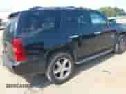 2014 Chevrolet Tahoe LS with VIN 1GNSCAE00ER122849, listed as a IAAI auction lot 42939558 with 186,637 mi miles and . Bid and sale history available at DreamBid. Image 4.