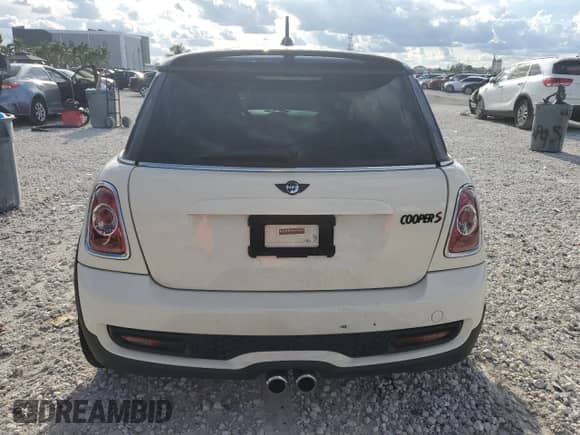 2011 MINI Hardtop S with VIN WMWSV3C51BTY23442, listed as a Copart auction lot 69919925 with Not provided miles and Salvage title. Bid and sale history available at DreamBid. Image 6.