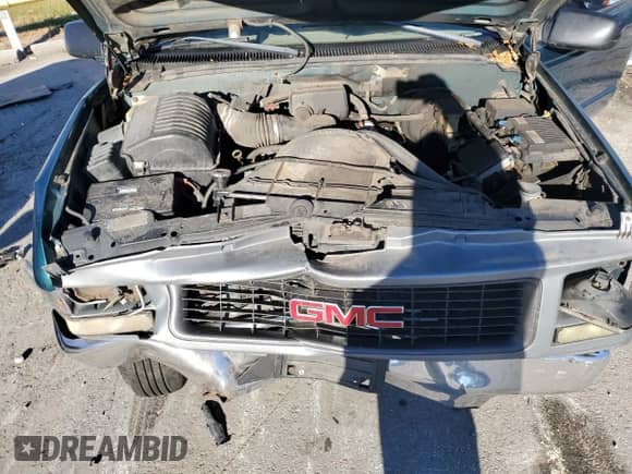 1998 GMC Sierra 1500 z VIN 1GTEC14W2WZ523039, wystawiony jako Copart lot #79906003 z przebiegiem 427 209 mil mil oraz Szkoda całkowita • Salvage title. Historia ofert i sprzedaży dostępna na DreamBid. Obrazek 11.