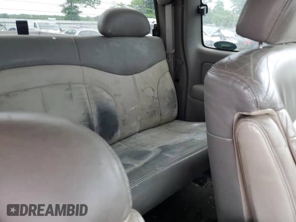 2002 GMC Sierra 1500 Denali z VIN 2GTFK69U321309689, wystawiony jako Copart lot #60267695 z przebiegiem 351 508 mil mil oraz Czysty tytuł • Clean title. Historia ofert i sprzedaży dostępna na DreamBid. Obrazek 10.