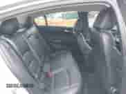 2018 Chevrolet Cruze LT z VIN 1G1BH5SE9J7130948, wystawiony jako IAAI lot #41813183 z przebiegiem 106 663 mil mil oraz . Historia ofert i sprzedaży dostępna na DreamBid. Obrazek 8.