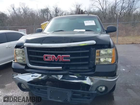 2007 GMC Sierra 1500 SLE1 z VIN 2GTEC13C671643993, wystawiony jako IAAI lot #41556101 z przebiegiem 212 097 mil mil oraz . Historia ofert i sprzedaży dostępna na DreamBid. Obrazek 12.