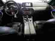 2018 BMW 5 Series M550i xDrive with VIN WBAJB9C54JB286660, listed as a Copart auction lot 62594805 with 137,794 mi miles and Salvage title. Bid and sale history available at DreamBid. Image 8.