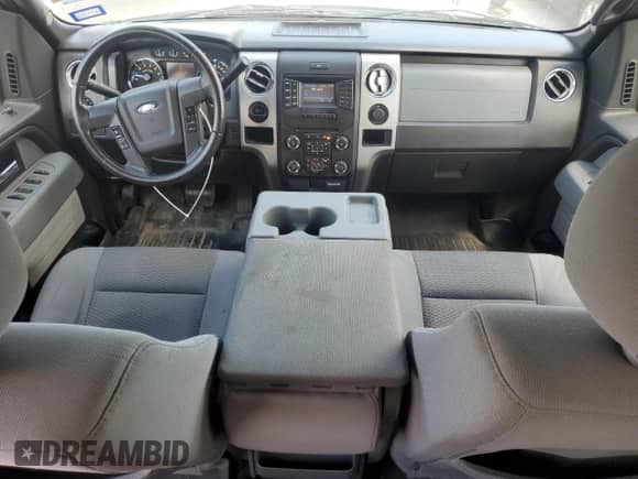 2014 Ford F-150 XLT с VIN 1FTEW1CMXEFB66460, выставлен на аукционе Copart как лот 62214535 с пробегом 211 244 миль миль и Списание • Salvage title. История ставок и продаж доступна на DreamBid. Изображение 8.