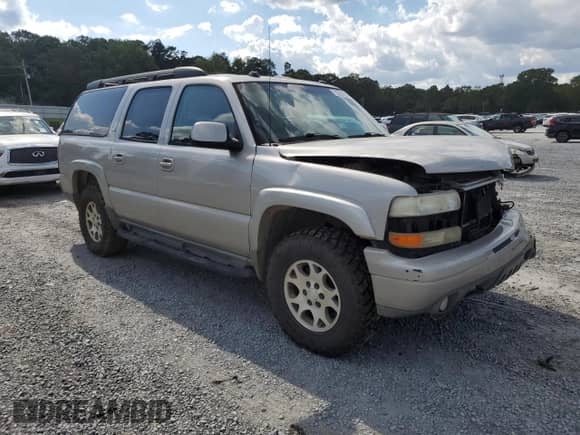 2005 Chevrolet Suburban LS z VIN 3GNFK16Z85G223199, wystawiony jako Copart lot #71655784 z przebiegiem Nie podano mil oraz Szkoda całkowita • Salvage title. Historia ofert i sprzedaży dostępna na DreamBid. Obrazek 4.