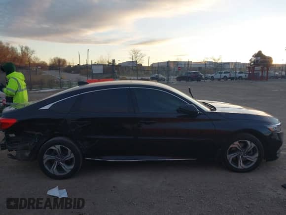 2020 Honda Accord EX-L with VIN 1HGCV2F53LA019767, listed as a IAAI auction lot 41047631 with 216,837 mi miles and . Bid and sale history available at DreamBid. Image 14.