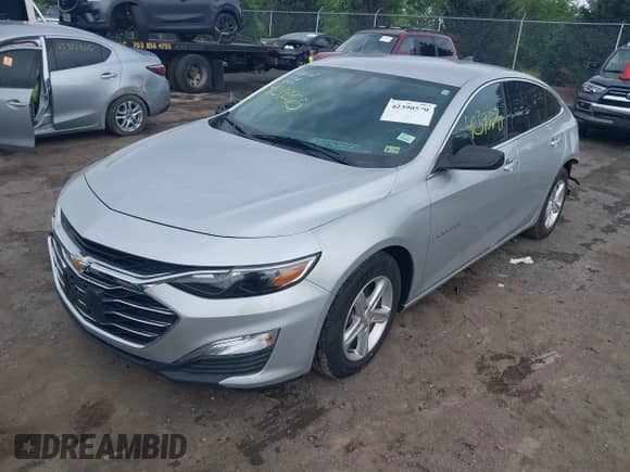 2021 Chevrolet Malibu LS z VIN 1G1ZC5ST2MF084143, wystawiony jako IAAI lot #42390570 z przebiegiem 29 658 mil mil oraz . Historia ofert i sprzedaży dostępna na DreamBid. Obrazek 2.