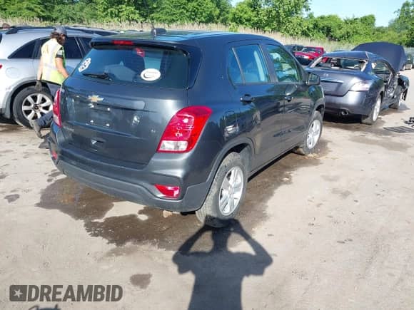 2019 Chevrolet Trax LS with VIN 3GNCJNSB0KL270140, listed as a IAAI auction lot 42297428 with 99,462 mi miles and . Bid and sale history available at DreamBid. Image 4.