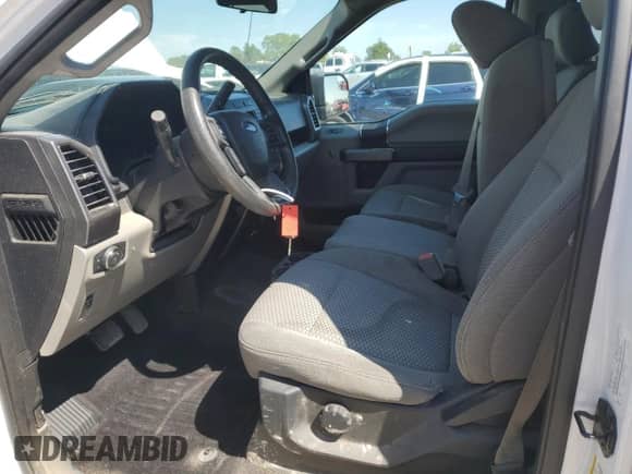 2018 Ford F-150 XL with VIN 1FTEW1E5XJFC55400, listed as a Copart auction lot 71768395 with 121,067 mi miles and Salvage title. Bid and sale history available at DreamBid. Image 7.