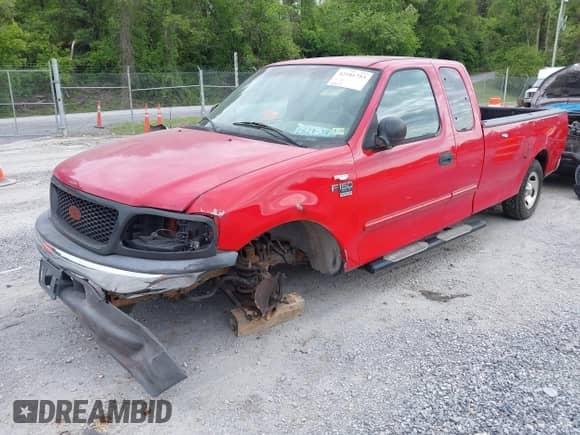 2004 Ford F-150 XL with VIN 2FTRX17WX4CA26798, listed as a IAAI auction lot 42181753 with 189,143 mi miles and . Bid and sale history available at DreamBid. Image 2.
