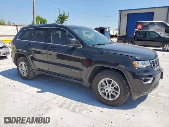 2018 Jeep Grand Cherokee Laredo z VIN 1C4RJEAG2JC480930, wystawiony jako Copart lot #65184965 z przebiegiem 70 700 mil mil oraz Szkoda całkowita • Salvage title. Historia ofert i sprzedaży dostępna na DreamBid. Obrazek 4.