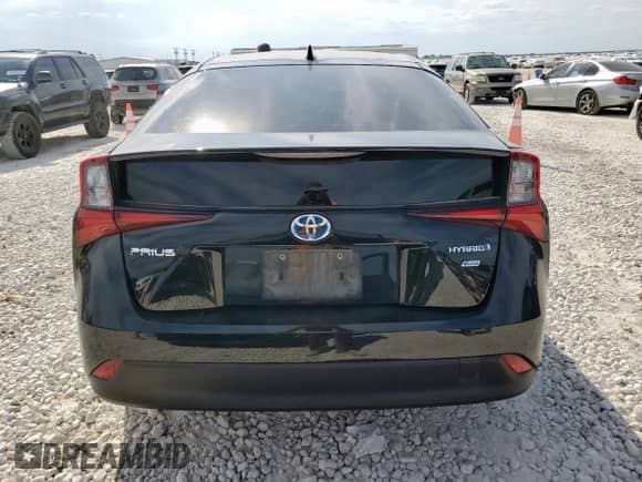 2019 Toyota Prius LE с VIN JTDKARFU5K3096004, выставлен на аукционе Copart как лот 84061025 с пробегом 82 590 миль миль и Списание • Salvage title. История ставок и продаж доступна на DreamBid. Изображение 6.