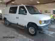 2003 Ford Econoline Cargo with VIN 1FTNE24W53HA22180, listed as a IAAI auction lot 42206484 with 306,921 mi miles and . Bid and sale history available at DreamBid. Image 1.
