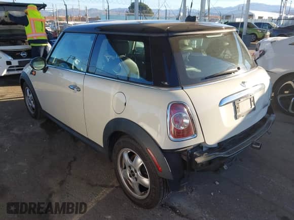 2011 MINI Hardtop with VIN WMWSU3C56BT094728, listed as a IAAI auction lot 43481511 with 107,659 mi miles and . Bid and sale history available at DreamBid. Image 3.