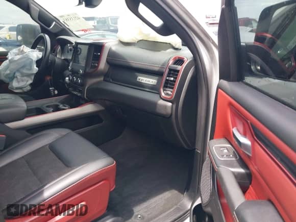 2020 Ram 1500 Rebel with VIN 1C6SRFLT8LN229872, listed as a IAAI auction lot 42135383 with 71,741 mi miles and . Bid and sale history available at DreamBid. Image 5.