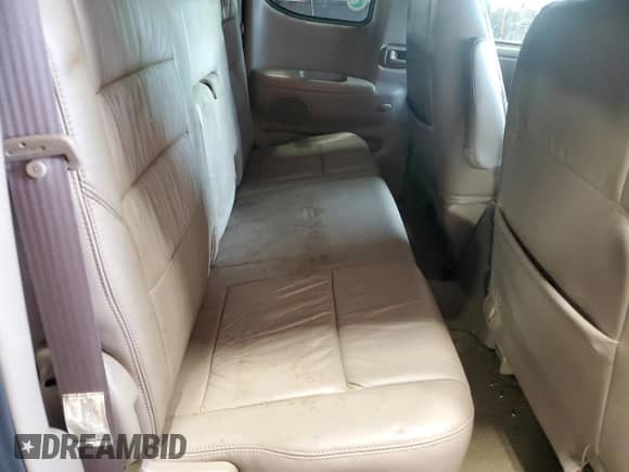 2001 Toyota Tundra Limited z VIN 5TBBT48141S154805, wystawiony jako Copart lot #66225125 z przebiegiem 216 119 mil mil oraz Czysty tytuł • Clean title. Historia ofert i sprzedaży dostępna na DreamBid. Obrazek 10.