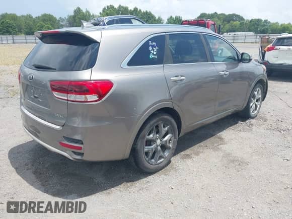 2016 Kia Sorento SXL with VIN 5XYPK4A58GG115170, listed as a IAAI auction lot 42689300 with 123,640 mi miles and . Bid and sale history available at DreamBid. Image 4.