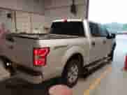 2019 Ford F-150 XL with VIN 1FTEW1CB6KKF19035, listed as a IAAI auction lot 42128282 with 114,573 mi miles and . Bid and sale history available at DreamBid. Image 4.