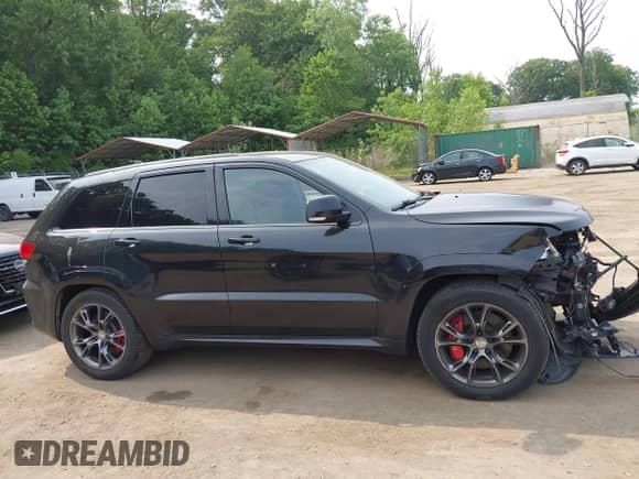 2014 Jeep Grand Cherokee SRT-8 с VIN 1C4RJFDJ1EC517310, выставлен на аукционе IAAI как лот 42383955 с пробегом 104 701 миль миль и . История ставок и продаж доступна на DreamBid. Изображение 13.