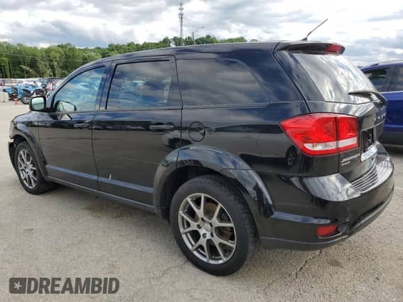 2014 Dodge Journey R/T with VIN 3C4PDDEG9ET184400, listed as a Copart auction lot 57914685 with 145,053 mi miles and Salvage title. Bid and sale history available at DreamBid. Image 2.