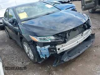 2023 Toyota Camry LE z VIN 4T1R11AK7PU130043, wystawiony jako IAAI lot #43289865 z przebiegiem 24 472 mil mil oraz . Historia ofert i sprzedaży dostępna na DreamBid. Obrazek 1.