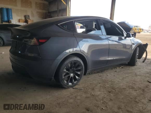 2021 Tesla Model Y Long Range with VIN 5YJYGDEE7MF206059, listed as a Copart auction lot 80559965 with 77,329 mi miles and Salvage title. Bid and sale history available at DreamBid. Image 3.