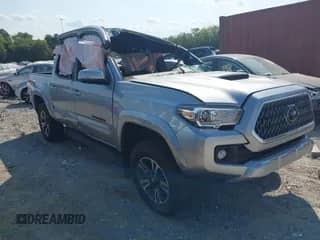 2019 Toyota Tacoma SR z VIN 5TFCZ5AN9KX204946, wystawiony jako IAAI lot #43123693 z przebiegiem Nie podano mil oraz . Historia ofert i sprzedaży dostępna na DreamBid. Obrazek 1.