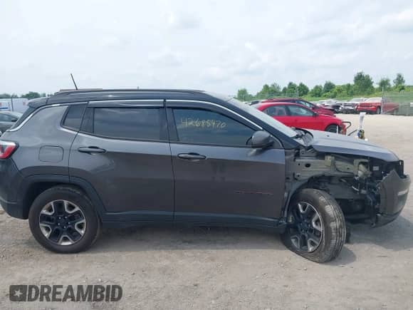 2018 Jeep Compass Trailhawk z VIN 3C4NJDDBXJT198919, wystawiony jako IAAI lot #42685470 z przebiegiem 139 764 mil mil oraz . Historia ofert i sprzedaży dostępna na DreamBid. Obrazek 14.