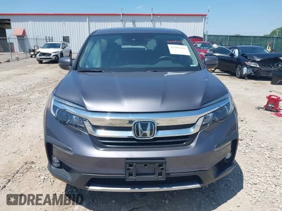 2020 Honda Pilot EX-L with VIN 5FNYF6H53LB011181, listed as a IAAI auction lot 42385292 with 63,641 mi miles and . Bid and sale history available at DreamBid. Image 11.