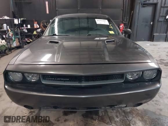 2013 Dodge Challenger SXT с VIN 2C3CDYAG5DH593050, выставлен на аукционе IAAI как лот 43392807 с пробегом 163 707 миль миль и . История ставок и продаж доступна на DreamBid. Изображение 12.