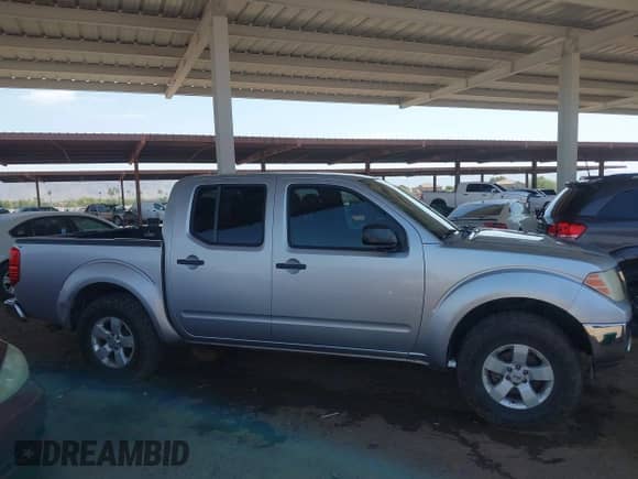 2009 Nissan Frontier SE z VIN 1N6AD07U59C405247, wystawiony jako IAAI lot #42821636 z przebiegiem 164 946 mil mil oraz . Historia ofert i sprzedaży dostępna na DreamBid. Obrazek 12.