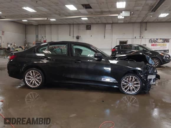 2023 BMW 3 Series 330i xDrive with VIN 3MW89FF00P8D57937, listed as a IAAI auction lot 43081403 with 19,195 mi miles and . Bid and sale history available at DreamBid. Image 14.