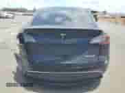 2023 Tesla Model Y Performance z VIN 7SAYGDEF0PF958265, wystawiony jako Copart lot #65881755 z przebiegiem 9 581 mil mil oraz Szkoda całkowita • Salvage title. Historia ofert i sprzedaży dostępna na DreamBid. Obrazek 6.