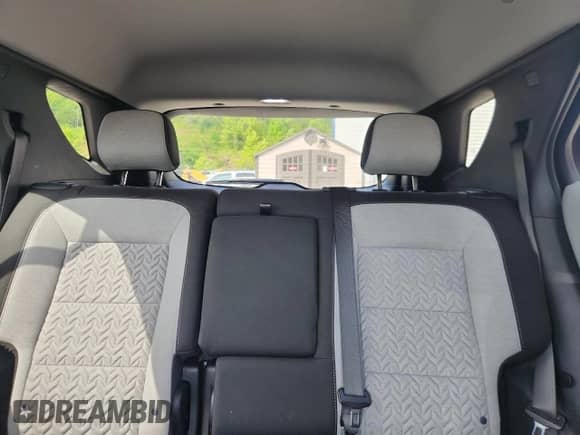 2023 Chevrolet Equinox LS z VIN 3GNAXSEGXPL224477, wystawiony jako Copart lot #65245775 z przebiegiem 9 907 mil mil oraz Szkoda całkowita • Salvage title. Historia ofert i sprzedaży dostępna na DreamBid. Obrazek 10.