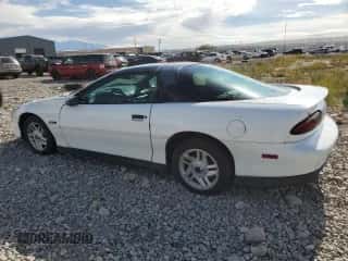 1994 Chevrolet Camaro Z28 z VIN 2G1FP22P5R2206396, wystawiony jako Copart lot #77457584 z przebiegiem 219 692 mil mil oraz Szkoda całkowita • Salvage title. Historia ofert i sprzedaży dostępna na DreamBid. Obrazek 2.