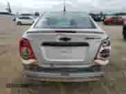 2013 Chevrolet Sonic LTZ с VIN 1G1JE5SH7D4152807, выставлен на аукционе Copart как лот 58600395 с пробегом 129 542 миль миль и Списание • Salvage title. История ставок и продаж доступна на DreamBid. Изображение 6.