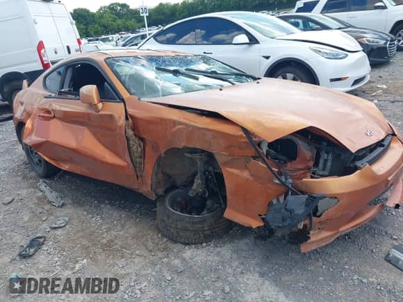 2006 Hyundai Tiburon GT с VIN KMHHN65F66U210071, выставлен на аукционе IAAI как лот 42752874 с пробегом Не указан миль и . История ставок и продаж доступна на DreamBid. Изображение 6.