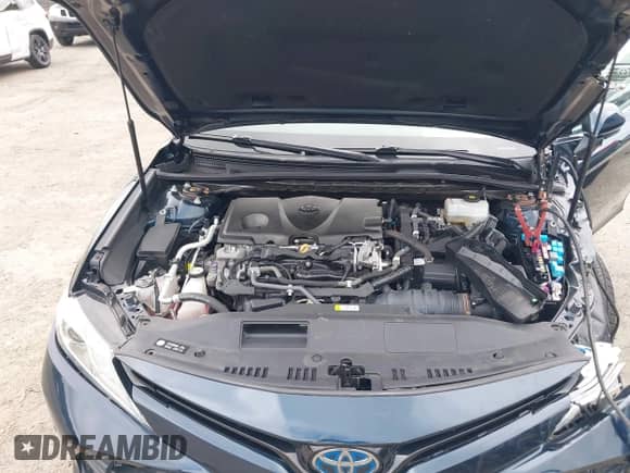 2020 Toyota Camry Hybrid XLE z VIN 4T1F31AK7LU521801, wystawiony jako IAAI lot #42707425 z przebiegiem 66 573 mil mil oraz . Historia ofert i sprzedaży dostępna na DreamBid. Obrazek 10.