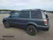 2006 Honda Pilot EX-L z VIN 2HKYF18596H504713, wystawiony jako Copart lot #81767915 z przebiegiem 231 388 mil mil oraz Szkoda całkowita • Salvage title. Historia ofert i sprzedaży dostępna na DreamBid. Obrazek 2.