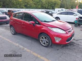 2012 Ford Fiesta SES with VIN 3FADP4FJ2CM196390, listed as a IAAI auction lot 43240588 with 142,304 mi miles and . Bid and sale history available at DreamBid. Image 1.