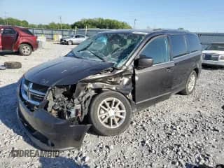 2020 Dodge Grand Caravan SXT with VIN 2C4RDGCG9LR205999, listed as a Copart auction lot 52371185 with 103,677 mi miles and Salvage title. Bid and sale history available at DreamBid. Image 1.