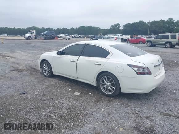 2013 Nissan Maxima SV z VIN 1N4AA5AP0DC800303, wystawiony jako IAAI lot #42946834 z przebiegiem 170 527 mil mil oraz . Historia ofert i sprzedaży dostępna na DreamBid. Obrazek 3.