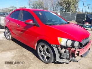2014 Chevrolet Sonic LTZ with VIN 1G1JE5SH8E4125424, listed as a IAAI auction lot 41649065 with 161,914 mi miles and . Bid and sale history available at DreamBid. Image 1.